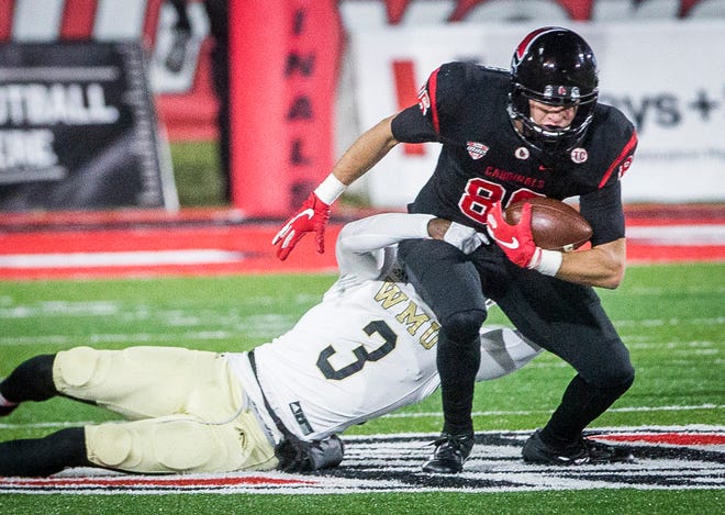 Ball State's Riley Miller tries to break free from a tackle against Western Michigan during their game at Scheumann Stadium Tuesday, Nov. 13, 2018.