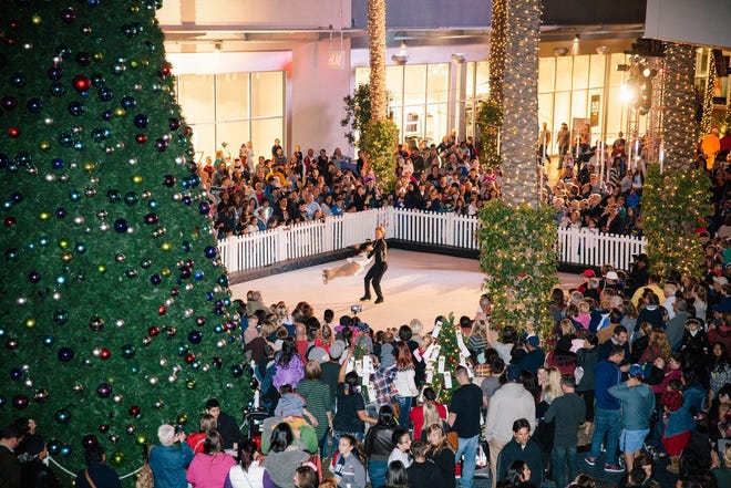 The ice skating rink and festivities at Tempe marketplace during the holiday season.