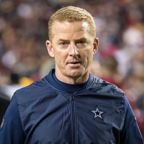 Dallas Cowboys head coach Jason Garrett looks on...