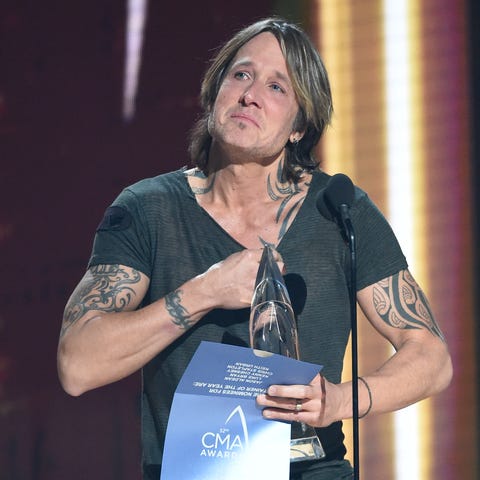 Keith Urban gets emotional as he accepts the...