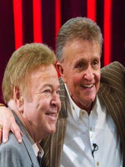 Roy Clark, left, and Bill Anderson spend time on the set of the 