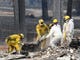 Search and rescue teams on Tuesday, Nov. 13, 2018, comb through rubble looking for the remains of victims killed in the Camp Fire in Paradise.