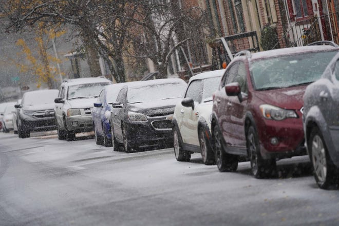Streets in Old New Castle get a dusting of snow Thursday morning.