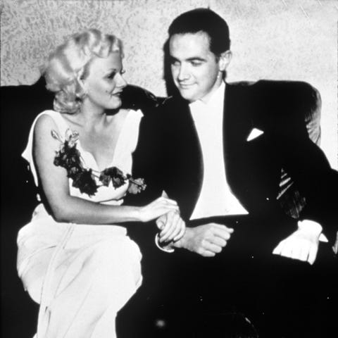Howard Hughes with actress Jean Harlow in an...