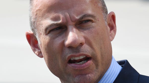 Michael Avenatti speaks to the press on July 27,...