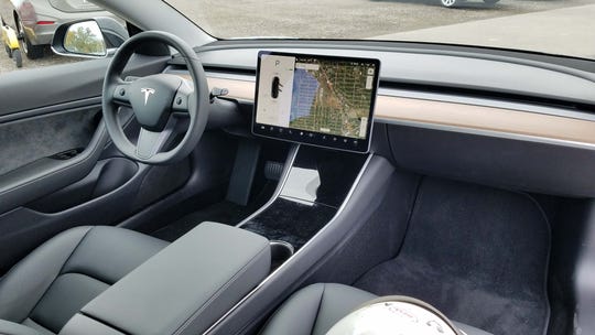 The Tesla Model 3 is almost entirely controlled via its 15-inch touch screen, making it an iPhone on wheels.