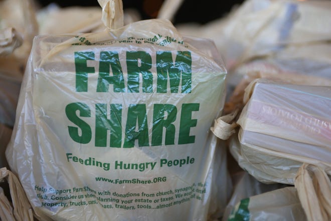 Farm Share prepares to provide roughly 1,000 meals for families in Quincy, Fla., Friday, Nov. 16, just in time for Thanksgiving. 