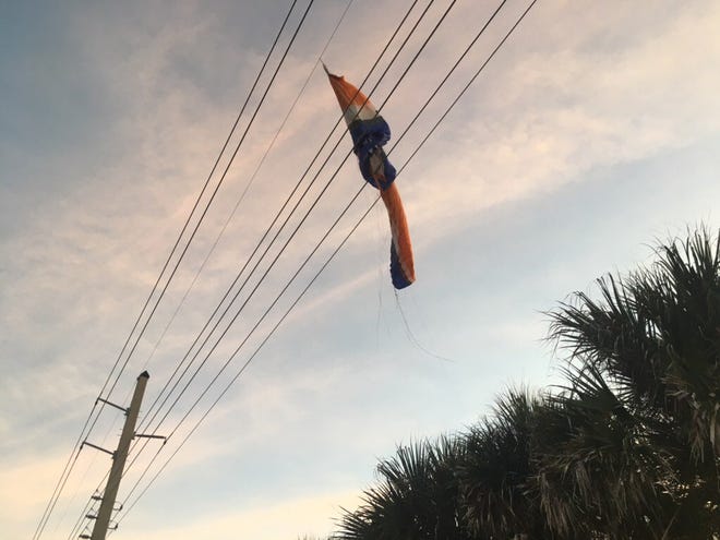 One injured after powered parachute hits electrical lines in Melbourne Beach.