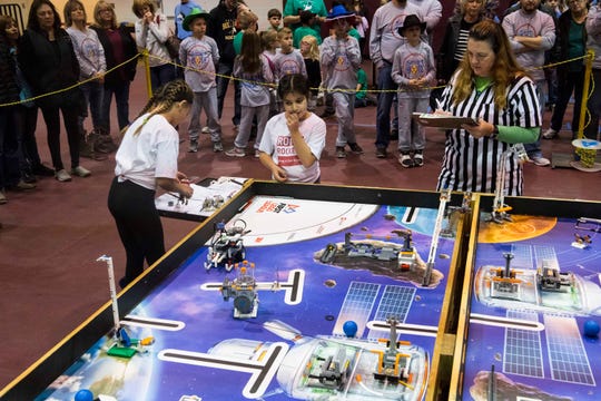 The Roose Rockets robotics team of Roose Elementary in Warren competes against the Smart Bots of Macomb, not pictured, at ThunderQuest.