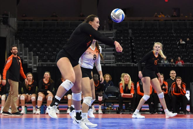 Washington's Lily Bartling (4) bumps the ball during a match against Rapid City, Saturday, Nov. 17, 2018, at the Denny Sanford Premier Center in Sioux Falls, S.D.