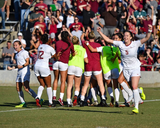 The FSU soccer team celebrates after beating No. 6 USC 5-4 in penalty kicks to advance to the NCAA Quarterfinals.