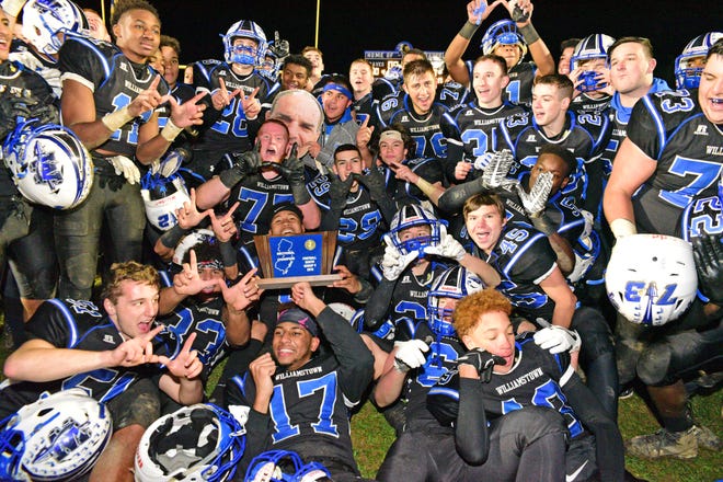 Williamstown celebrates their South Jersey Group 5 sectional title championship after defeating Rancocas Valley on Saturday.