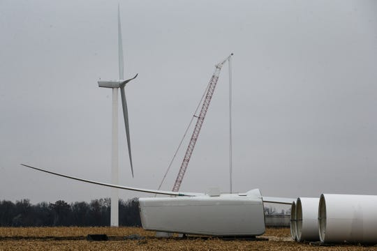 One of three wind turbines sits deconstructed in a field outside of Fairbank on Friday, Nov. 16, 2018. A district court judge ordered three wind turbines to be dismantled after deciding that Fayette county provided the developers permits illegally in 2014 who now have until December 9th to bring them all down.