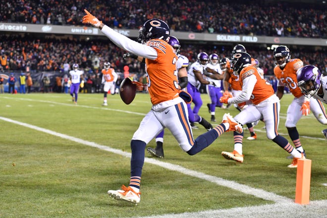 Chicago Bears defensive back Eddie Jackson (39) scores on an interception in the fourth quarter against the Minnesota Vikings at Soldier Field.