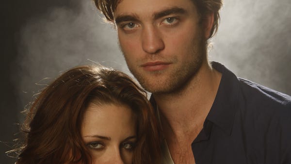 Kristen Stewart and Robert Pattinson shot from...