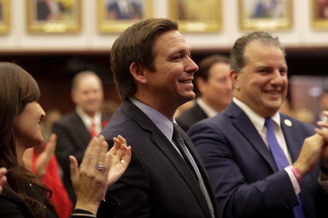 Governor Ron DeSantis stands as he is recognized during the Senate organizational session at the Florida State Capitol Tuesday, Nov. 20, 2018. 