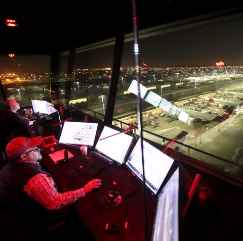 Air Traffic Launch Advisor George Dixon watches ta