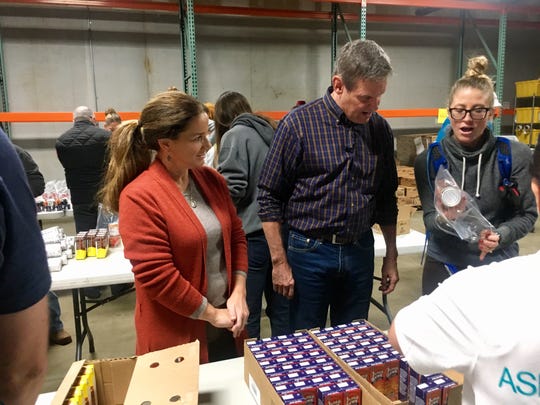 Gov.-elect Bill Lee and his wife, Maria, left, volunteer Nov. 21, 2018, at Second Harvest Food Bank in Nashville.