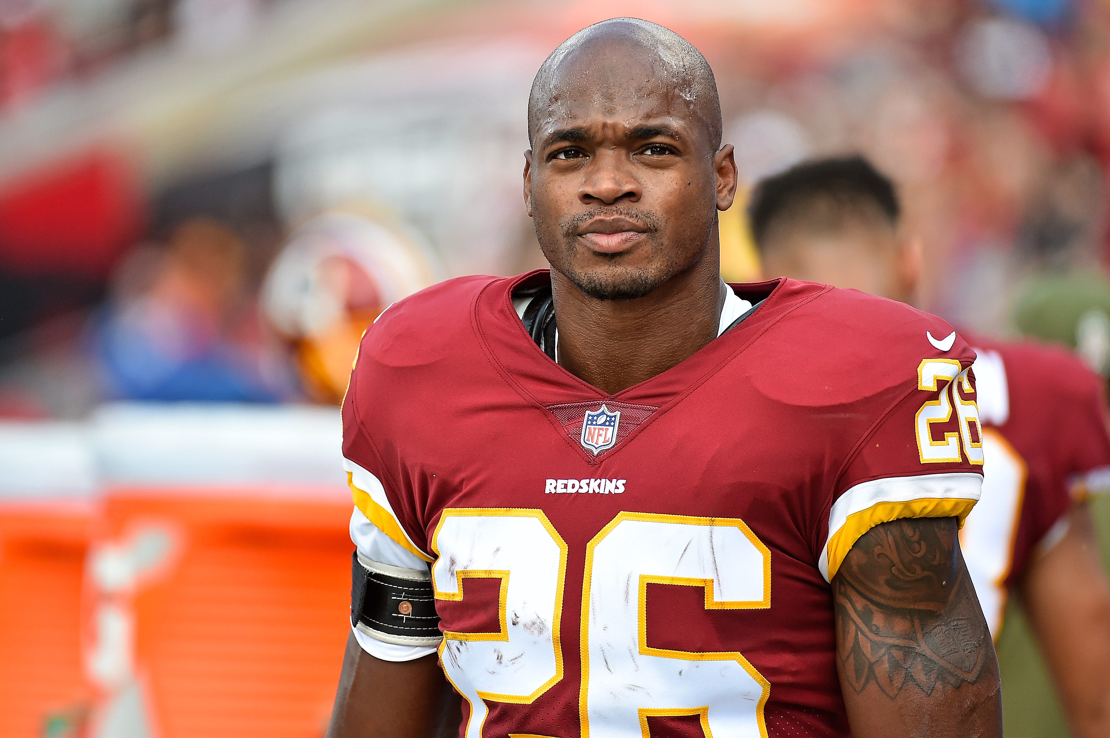 Redskins' Adrian Peterson admits he continues to spank his children