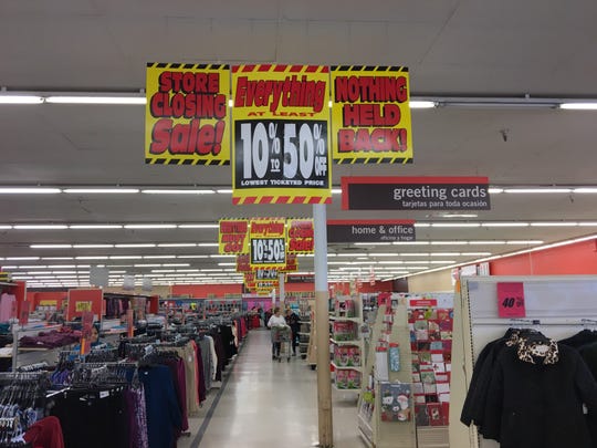 Shoppers looked for bargains at the Kmart in Springfield, Virginia, on Thanksgiving morning. It's one of 142 Sears and Kmart locations parent company Sears Holdings said would close when it filed for Chapter 11 bankruptcy protection last month.