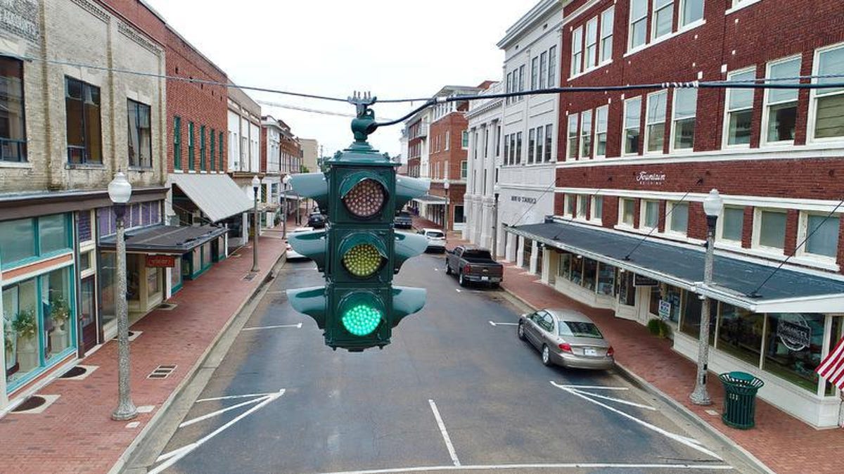 A stoplight located at an intersection on Howard Street in downtown Greenwood shines green. According to Barrett Williams, a historic preservationist, Greenwood has the most historic stoplights in the world.