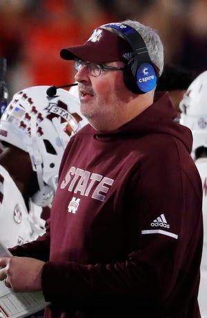 Mississippi State coach Joe Moorhead watches his players during the second half of an NCAA college football game against Mississippi in Oxford, Miss., Thursday, Nov. 22, 2018. Mississippi State won 35-3.