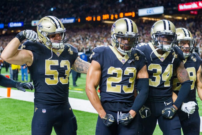 Saints defense celebrate in the back of the endzone after causing a fumble during the NFL football game between the New Orleans Saints and the Atlanta Falcons in the Mecedes-Benz Superdome. Thursday, Nov. 22, 2018.