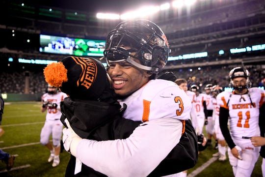 Hasbrouck Heights' Jasiah Purdie celebrates his team's 41-7 win over Butler for the North Group 1 championship on Friday, Nov. 23, 2018, in East Rutherford.