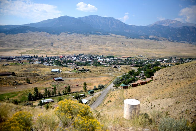 This Aug. 17, 2017 photo shows a view of Gardiner, Mont., the gateway town to Yellowstone National Park. Gardiner is struggling with housing affordability as home prices rise and owners turn rental properties into vacation rentals. The shift is contributing to a loss of students in the school district. (Rachel Leathe/Bozeman Daily Chronicle via AP)