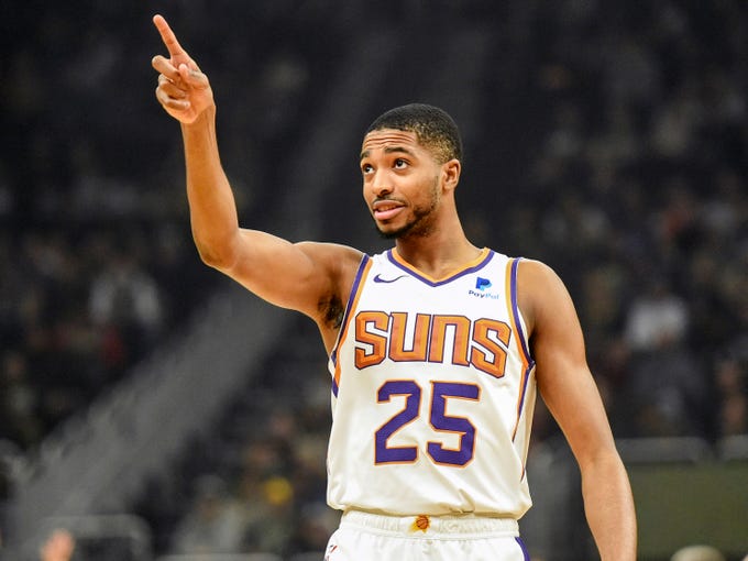 Suns forward Mikal Bridges gestures during the first quarter of a game Nov. 23 against the Milwaukee Bucks.