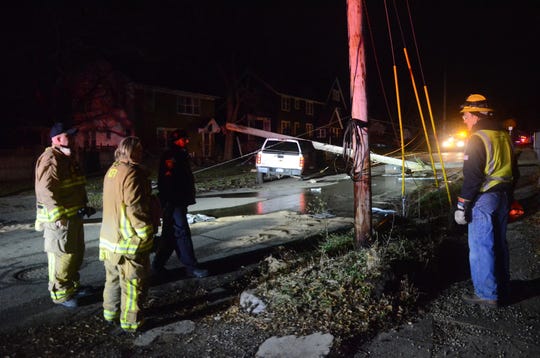 A woman was arrested after her pick-up hit a power pole on Terrace Avenue about 5:25 a.m. Sunday.