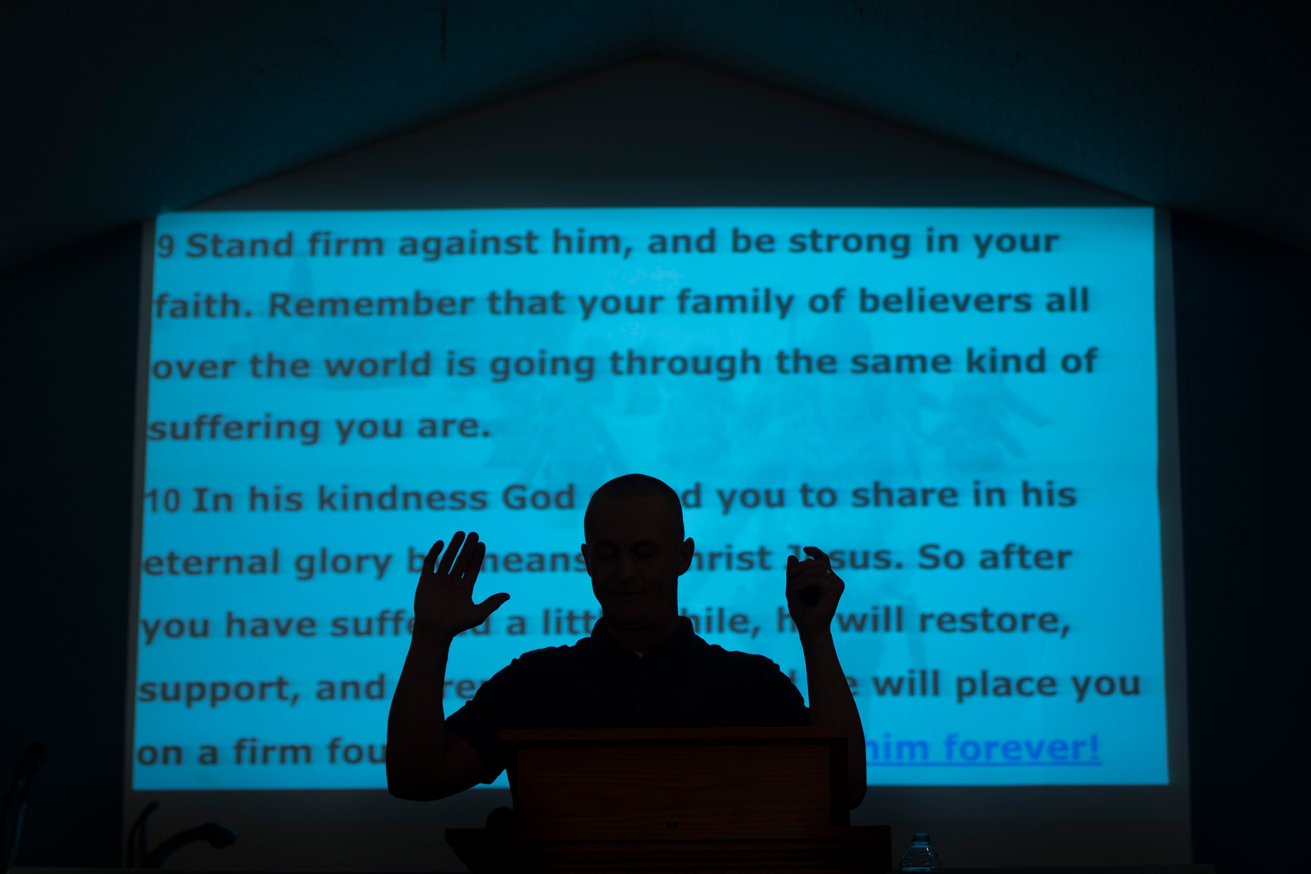 Jacob preaches a Sunday sermon at the New Covenant Church on Rural Street in Austin, Indiana. Howell was ordained as an assistant pastor for a year before being voted in as a senior pastor in November. “The word of God has offered me hope in my recovery, hope for what’s to come. It frees me of my past mistakes and let’s me know there’s a new beginning,” Howell said. “I always say I want to preach the gospel with as little words as possible. I’d like my life to be a true reflection of my heart.”  Nov. 4, 2018