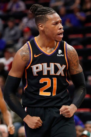 Nov 25, 2018; Detroit, MI, USA; Phoenix Suns forward Richaun Holmes (21) reacts after making a shot and getting fouled during the fourth quarter against the Detroit Pistons at Little Caesars Arena. Mandatory Credit: Raj Mehta-USA TODAY Sports