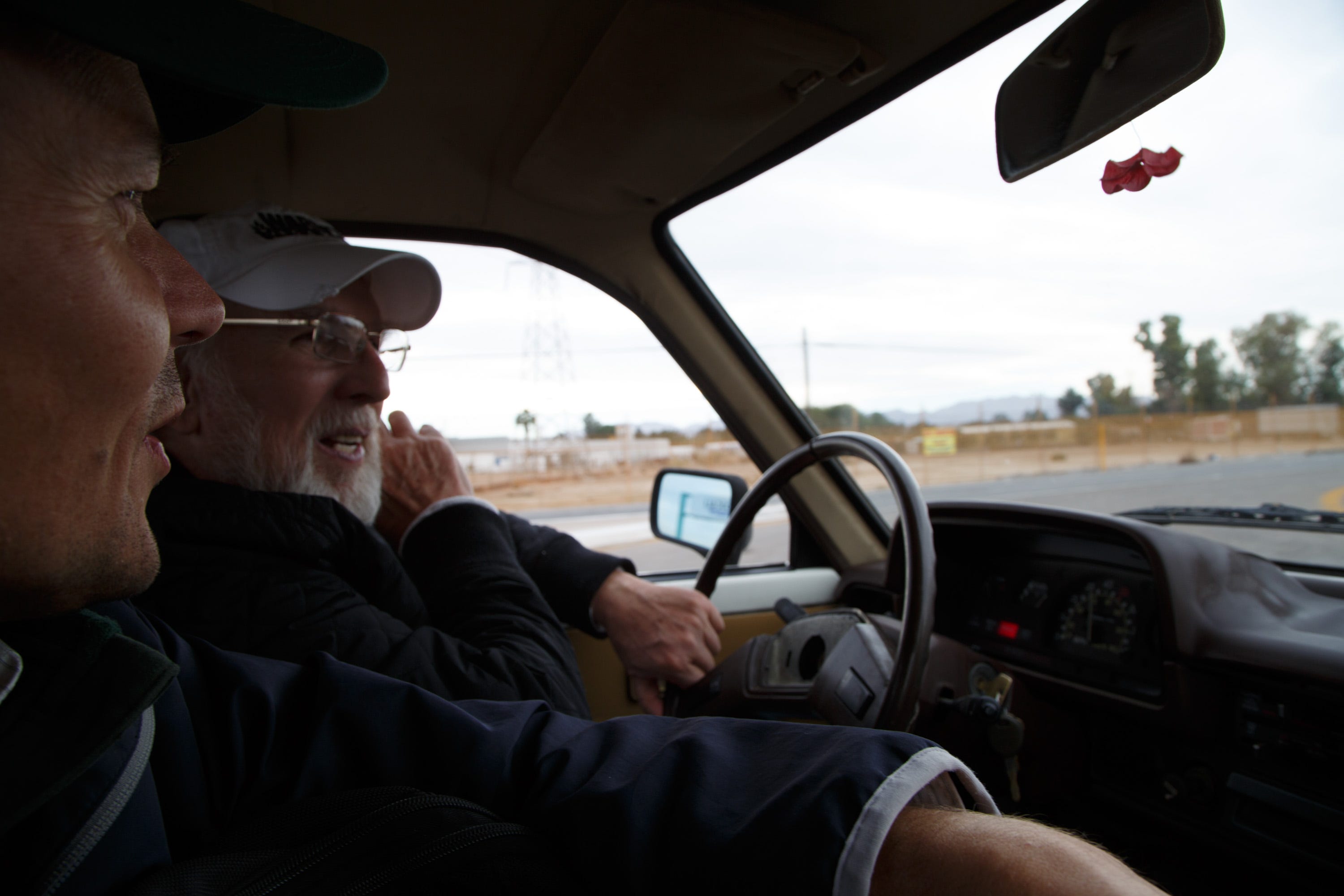 Ian James, left, tours the Mexicali area with Ray Askins, an environmental activist.