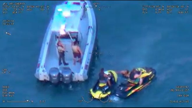 A pair of stranded jet skiers were rescued from the Sebastian Inlet.
