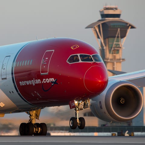 A Norwegian Air Boeing 787 Dreamliner takes off...