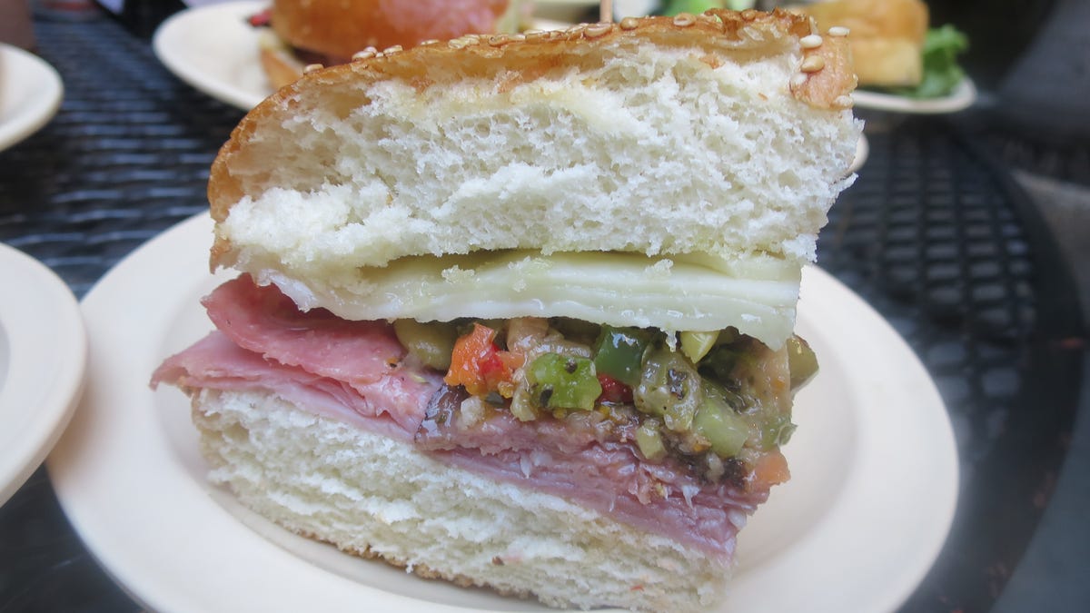 The most famous sandwich in New Orleans, the muffuletta, is uniquely served warm at the Napoleon House, so the cheese is just slightly melted.