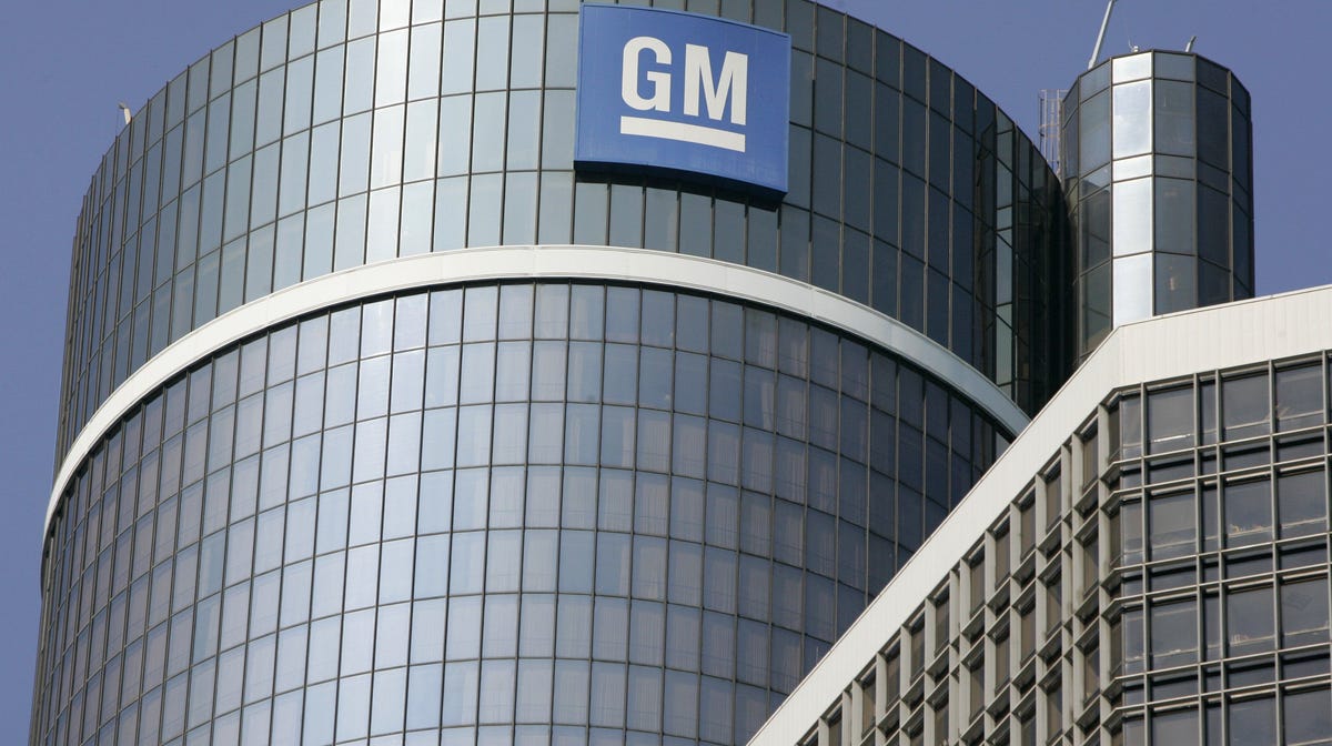 The GM logo is seen on the top of the center tower at the GM Renaissance Center in Detroit.