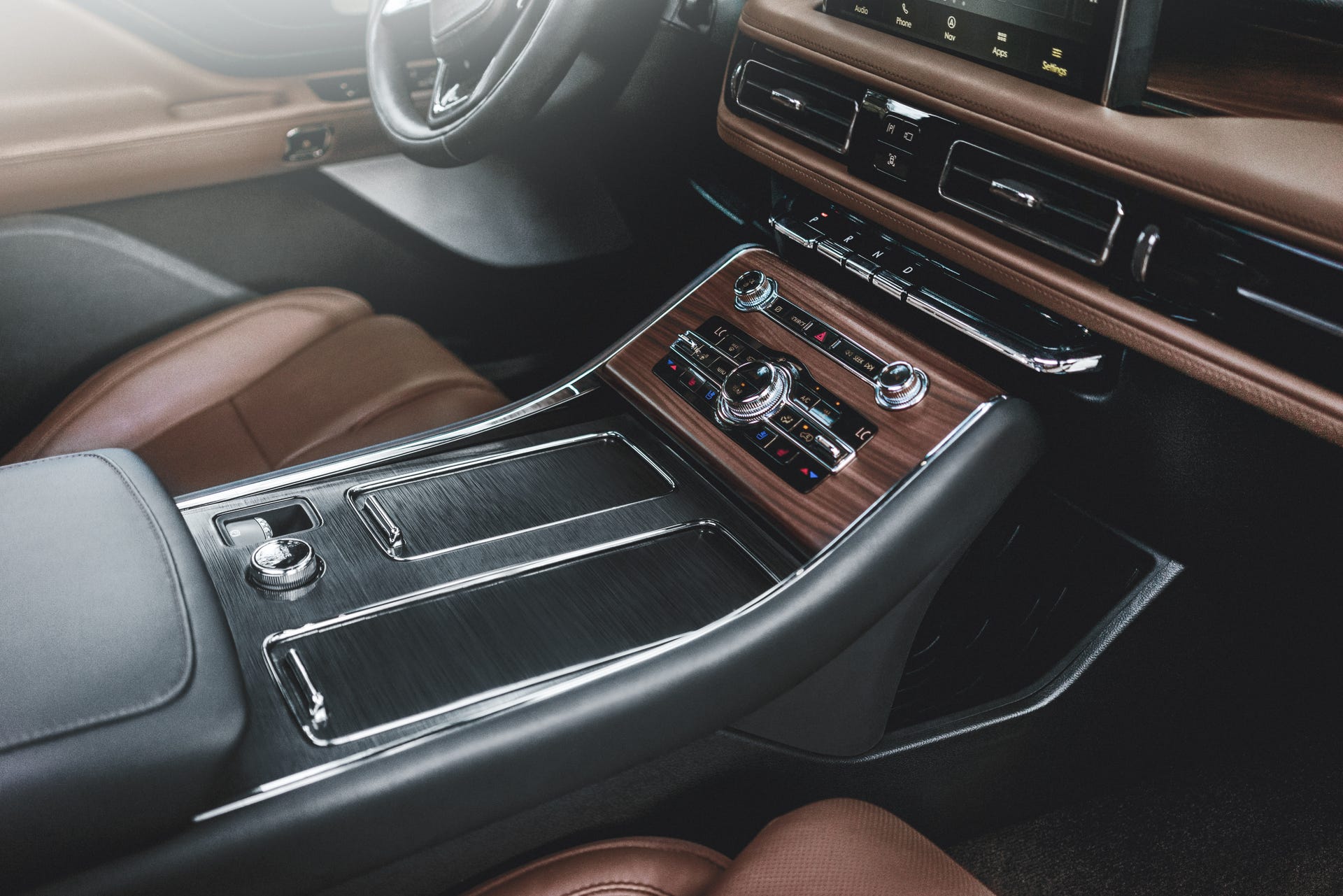 The all-new 2020 Lincoln Aviator has a 12.3-inch, fully digital instrument display, 10.5-inch console touchscreen, optional, signature 30-way seats, and individual rotary knobs for audio, climate control, and drive modes.
