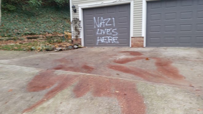 Vandals painted, "Nazi lives here," on the garage of David Bridges and Vicki Burch on Nov. 18, 2018. Burch is a Tippecanoe County Council member and Bridges, a Purdue professor, is faculty adviser to the Purdue University College Republicans. Police have no suspects in the vandalism.