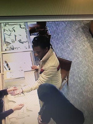 Local law enforcement believe these two men walked into a Kay Jewelers on Sunday, smashing a display case and making off with several pieces of jewelry. The picture captured from the store's surveillance camera was taken a few hours before the robbery.