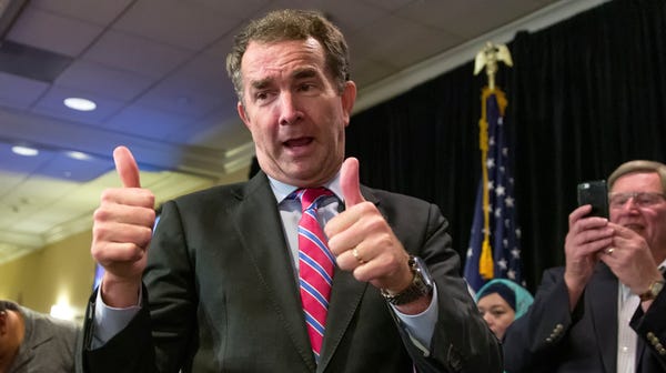 Gov. Ralph Northam, D-Va., gives thumbs up before...