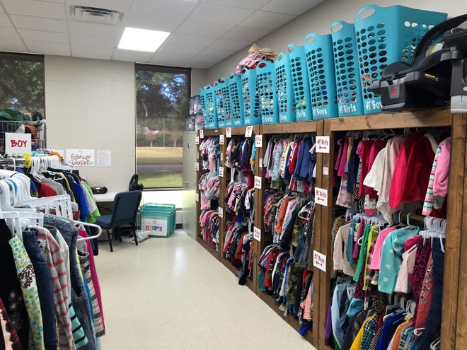 The Foster Care Closet earned the 2018 Community Impact Award. the nonprofit provides clothing and other items for kids who may enter foster care with nothing more than the outfit they're wearing at the time.