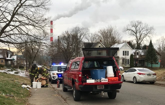 Members of the Chillicothe Fire Department hazardous materials team neutralize a couple one-pot meth labs found in a Hickory Street apartment on Thursday, Nov. 29, 2018.