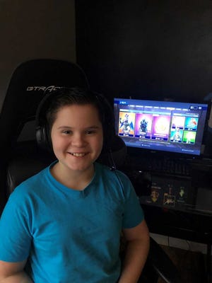 Joe Urban, 11, from Pinckney, and five friends from across the U.S. streamed gameplay of popular video game Fortnite to raise money for the American Foundation for Suicide Prevention.