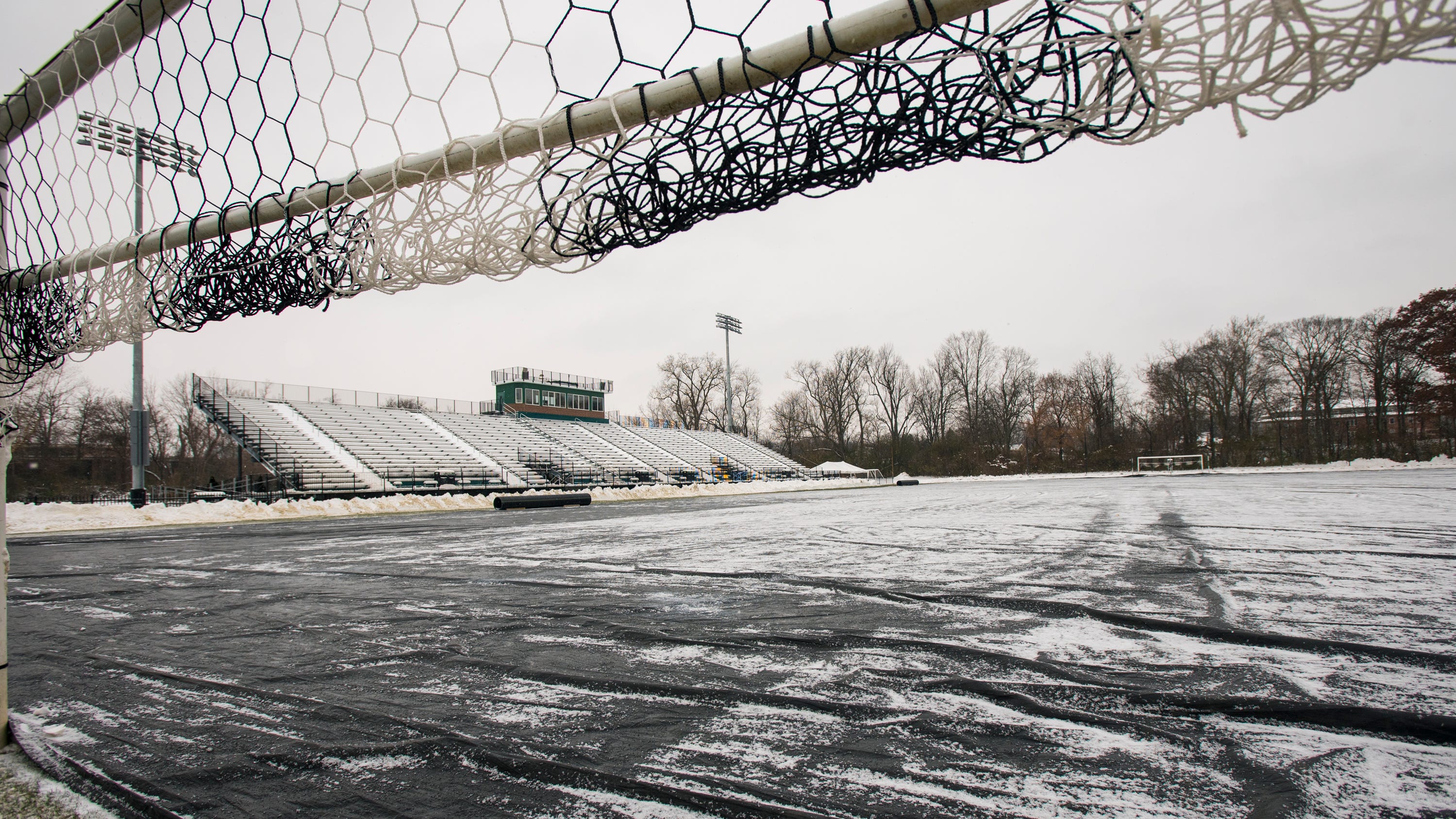 Michigan State Shovels Scrapes Covers Field For Historic Soccer Game Michigan State Shovels Scrapes Covers Field For Historic Soccer Game