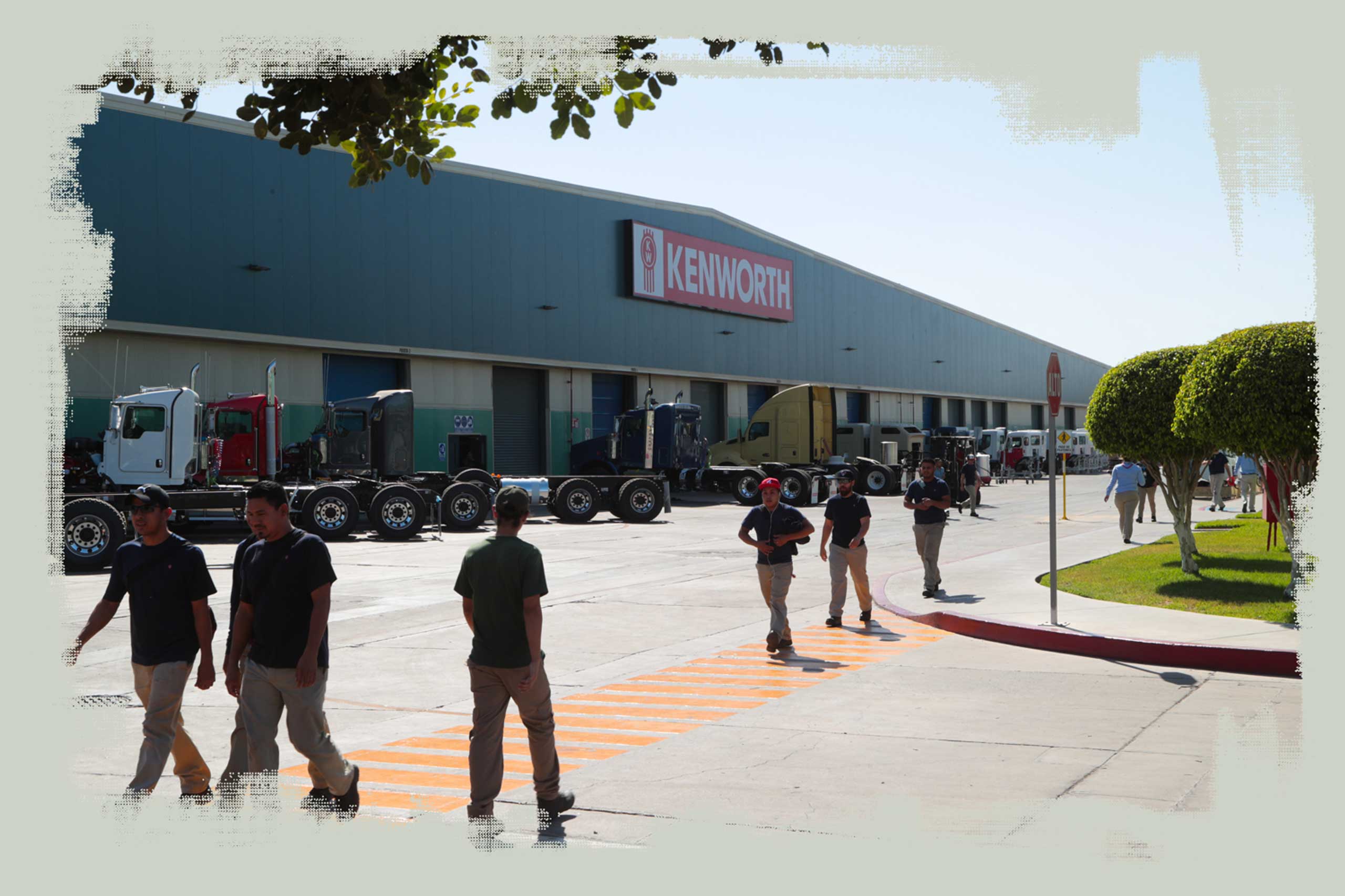 Workers leave the Kenworth factory during a shift change in Mexicali on June 6, 2018.