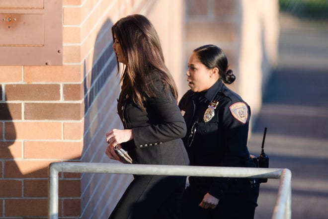 Former Pennsylvania Attorney General Kathleen Kane arrives at the Montgomery County Correctional Facility in Eagleville, Pa., to begin serving a 10- to 23-month perjury sentence, Thursday, Nov. 29, 2018. (AP Photo/Matt Rourke)