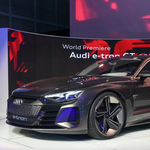 The Audi e-tron GT concept car is on display...