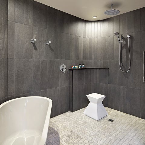 This is a bathtub and a shower at the Statler...